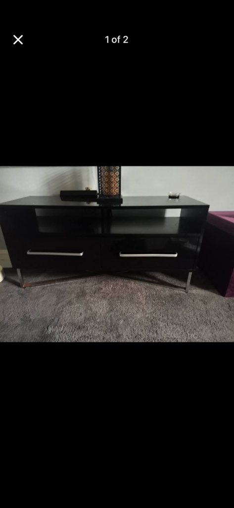 Black high gloss unit, with 2 shelves and 2 drawers, with chrome base