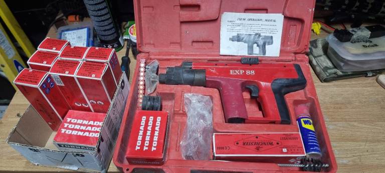Red EXP 88 Nail Gun Kit with Tornado Cartridges – Good Condition