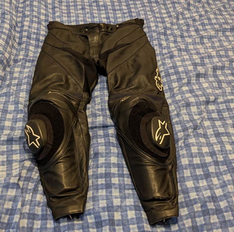 Alpinestars leather motorbike trousers with Alpinestars sliders. 