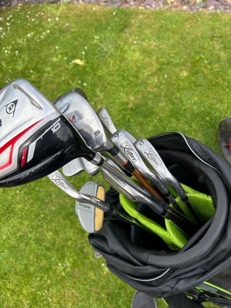 Golf clubs and trolley