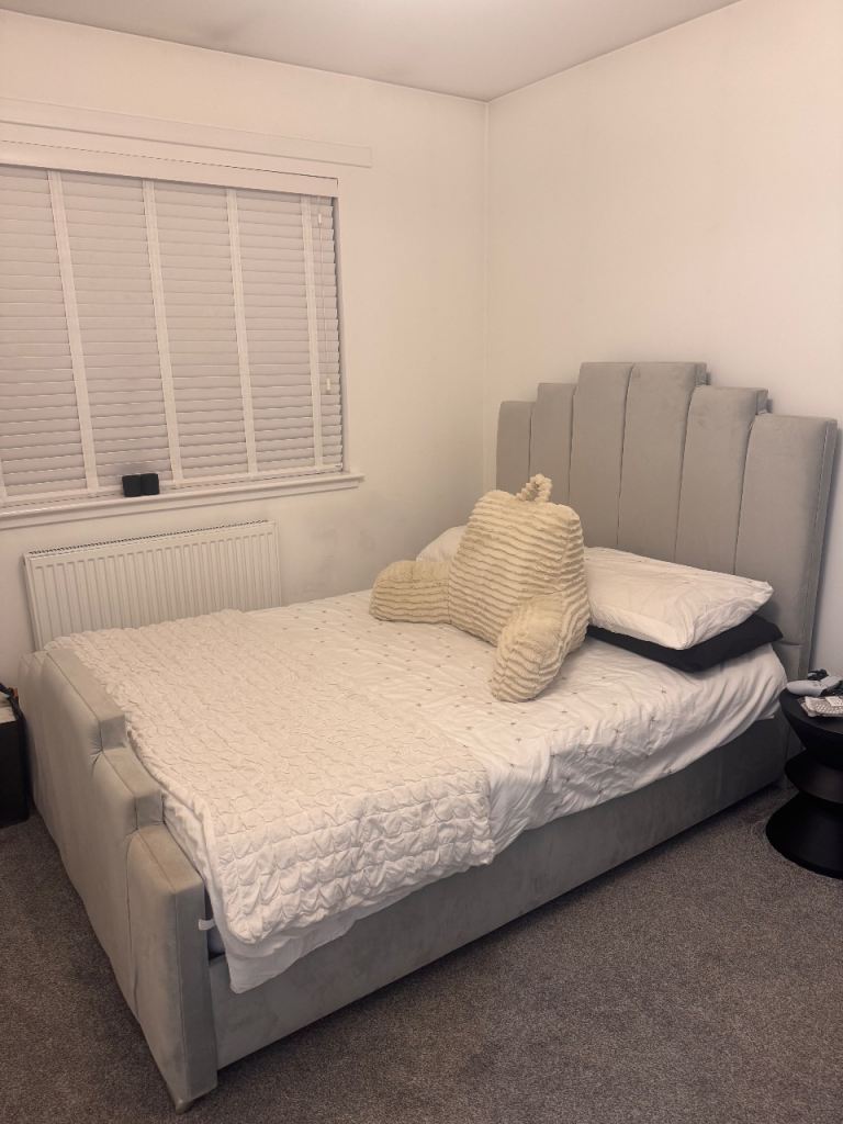 Stylish Double Bed Frame with Grey Fabric Finish and Distinctive Headboard
