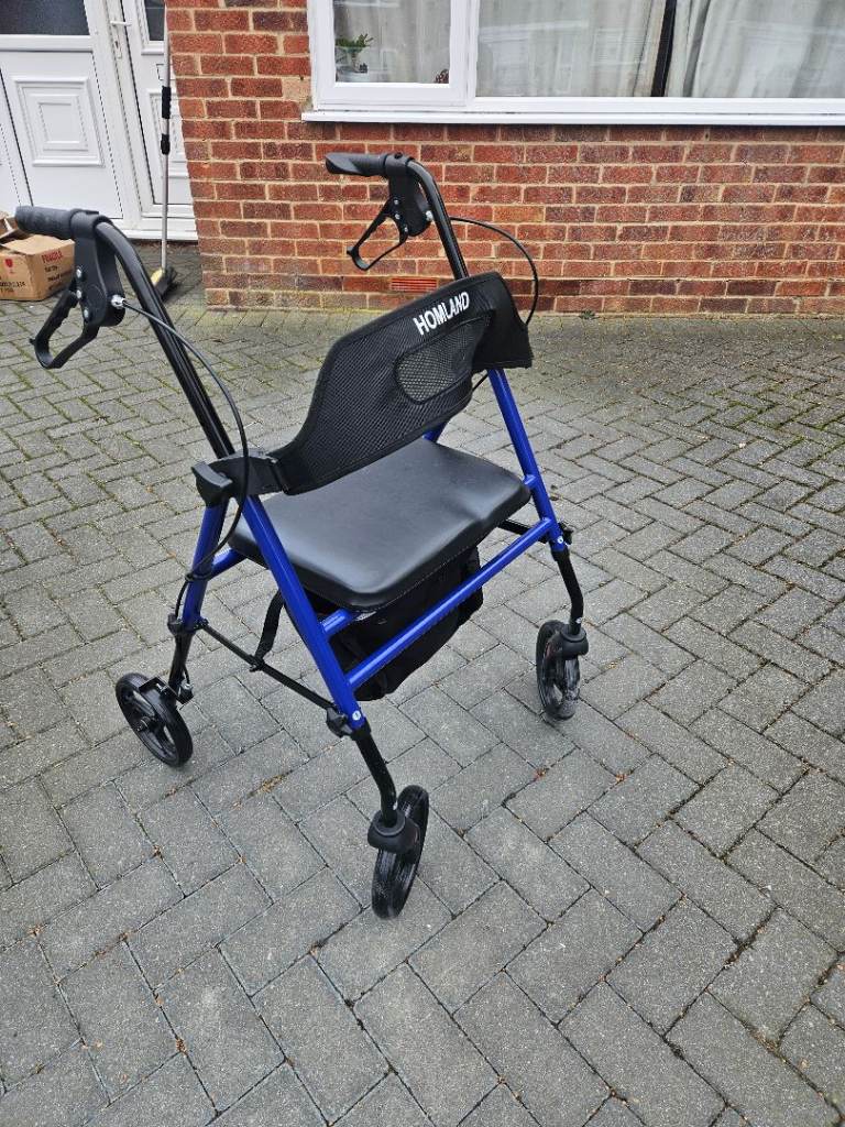 Folding walker with seat and storage