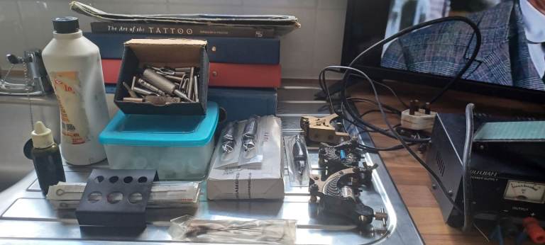Old school tattoo kit and flash art all kinds lots of flash to go threw from way back in the day 