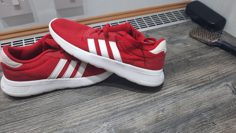 Red adidas trainers 