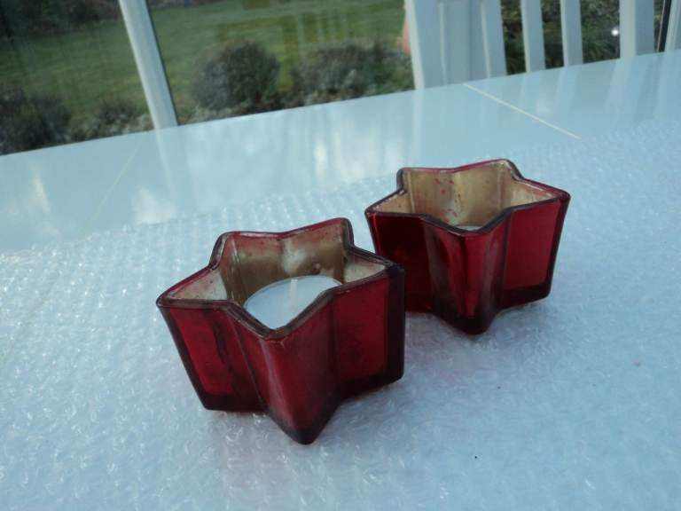 2 x red glass star shaped Christmas tea light holder.
