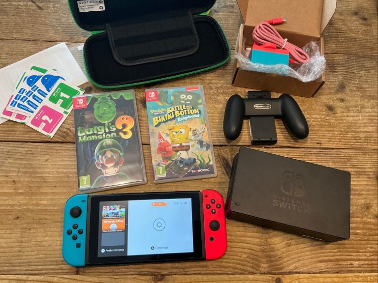 Nintendo switch games console, charger,case and 2 games 
