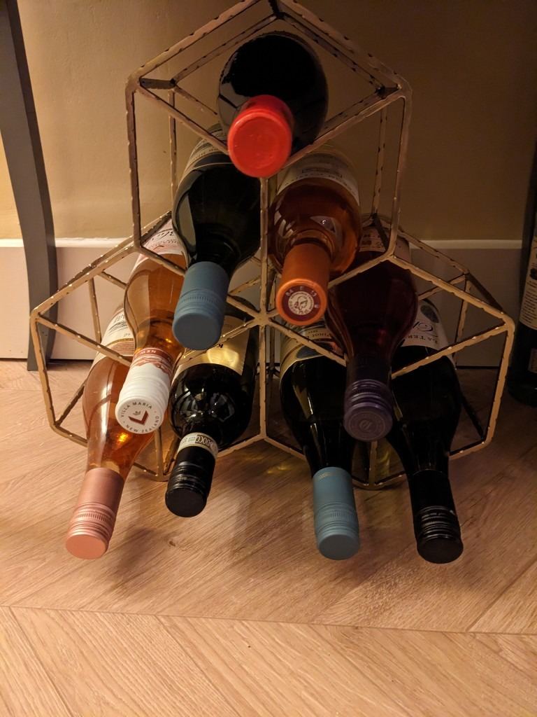 Oliver Bonas Gold geometric wine rack
