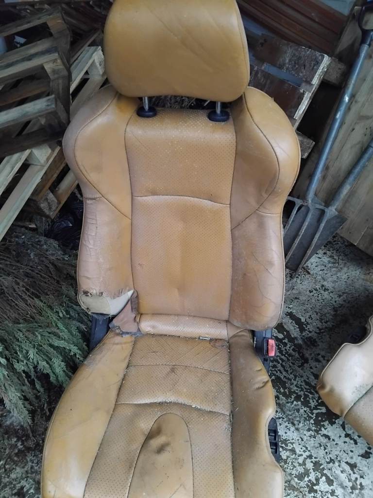 One Tan Leather Car Seat - Worn Condition