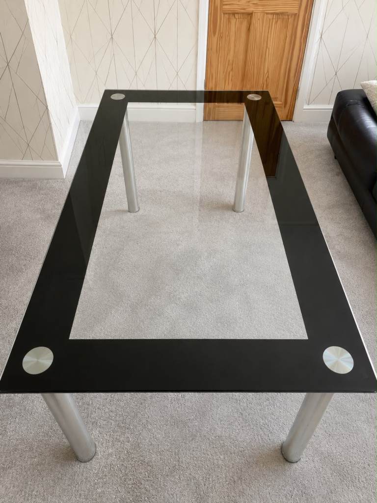Glass and chrome dining table
