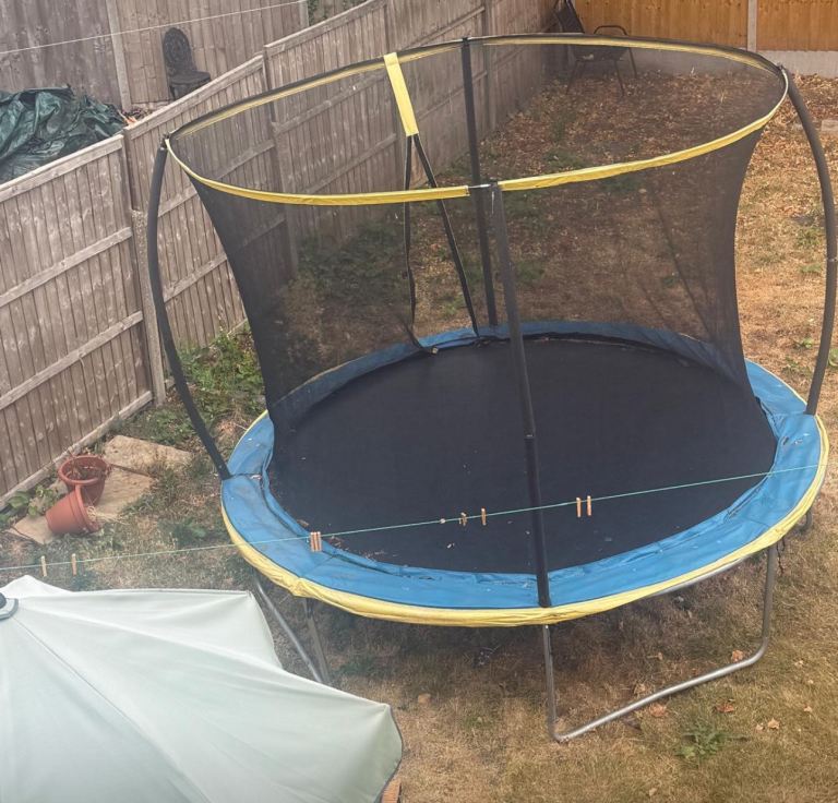 Garden Trampoline with Safety Net – Good Condition