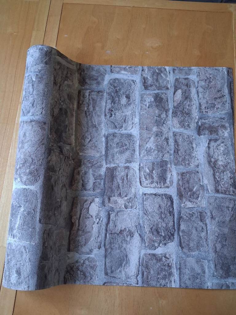 Free to collector 1 x roll of wallpaper (stone wall effect)