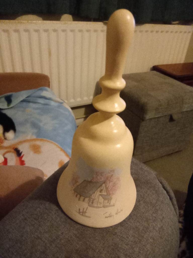 Ceramic bell with cottage design 