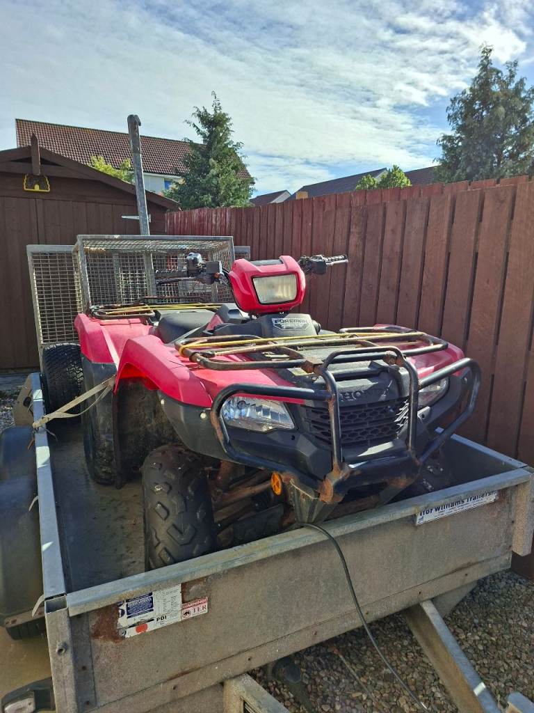 Quad bike with hill trailer