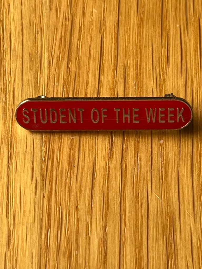 Student of the week red enamel badge. New. £2. Tqy or can post
