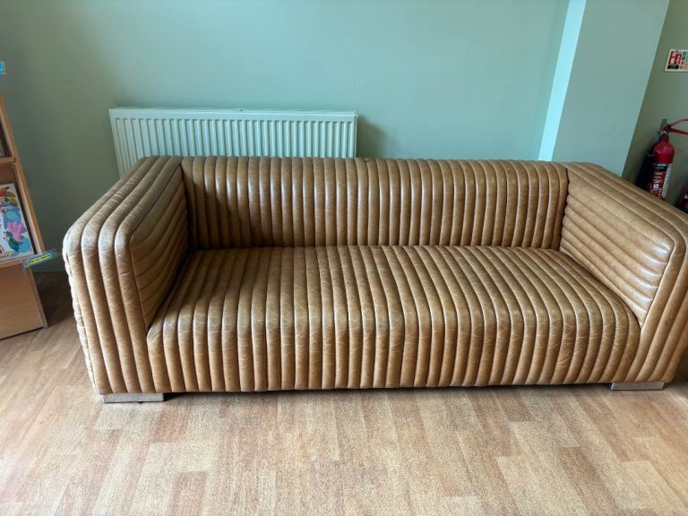 Brown/tan leather sofa and chair