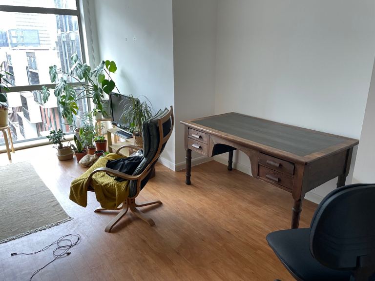 Large Antique wooden desk with green leather