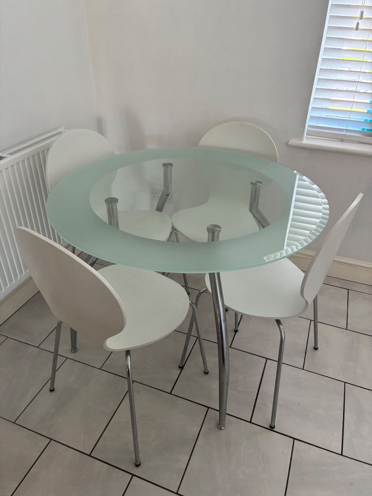 Glass Dining Table with 4 White Chairs – Good Condition
