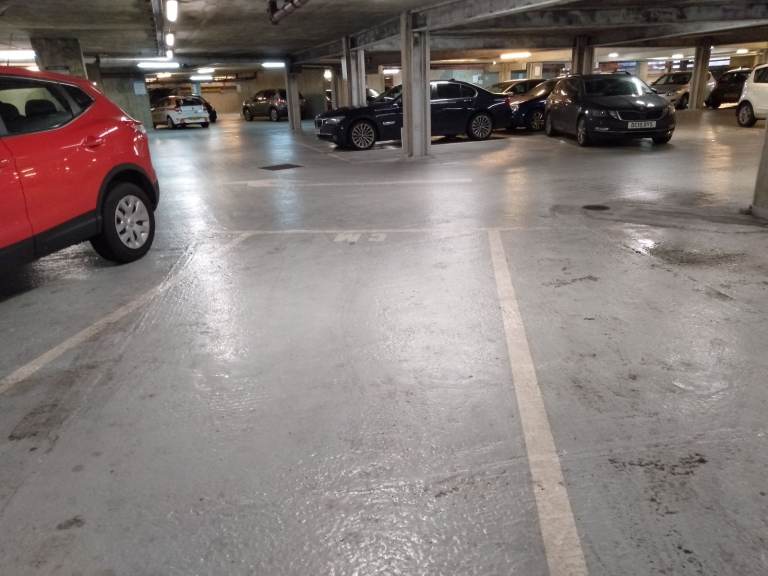 Secure Car Park on feltham high-street near train station.