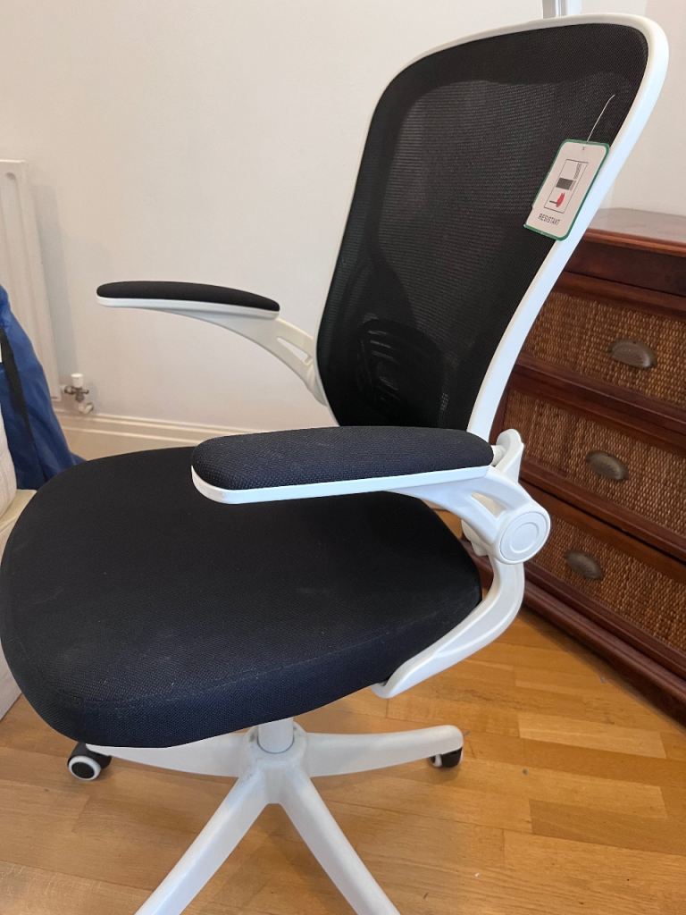 Ergonomic office chair, used but in working condition.