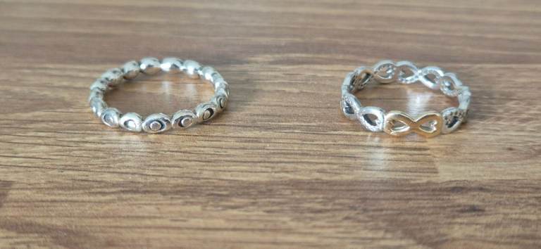Two Silver-Coloured Rings - Good Condition