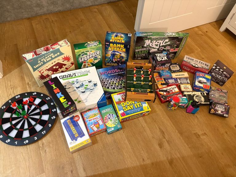 Job lot of toys including safety dart board, table top football, magic set, 