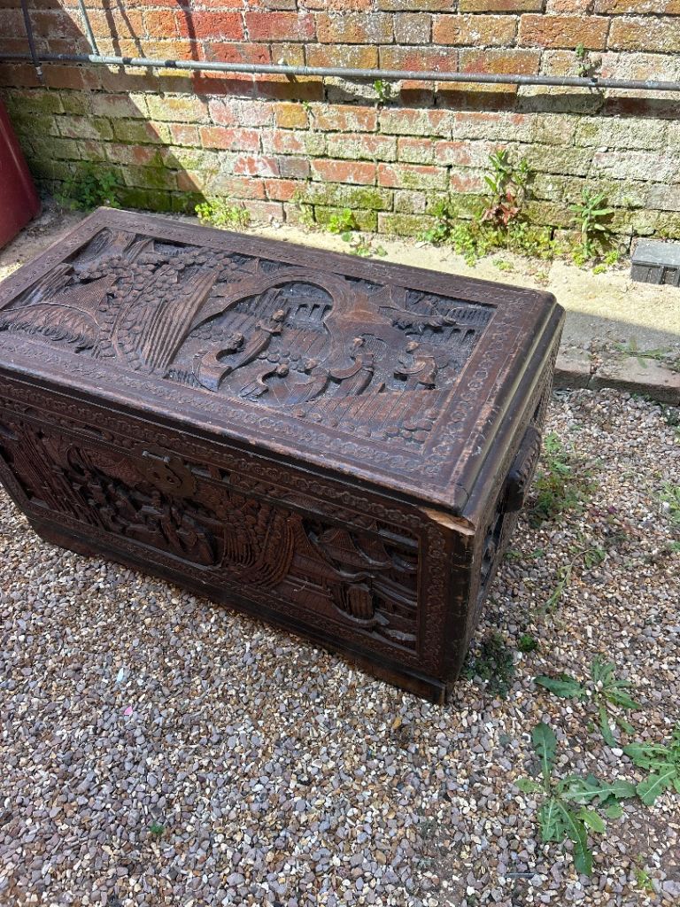 Large carved old storage chest 