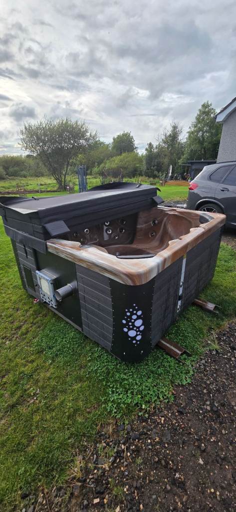 7 seater square hot tub with integrated wood burning stove
