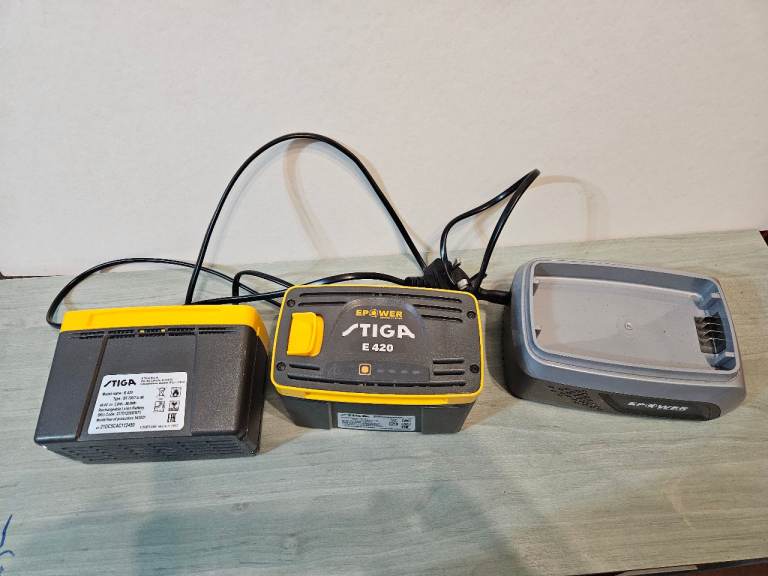 Battery and charger, for. Mountfield mower