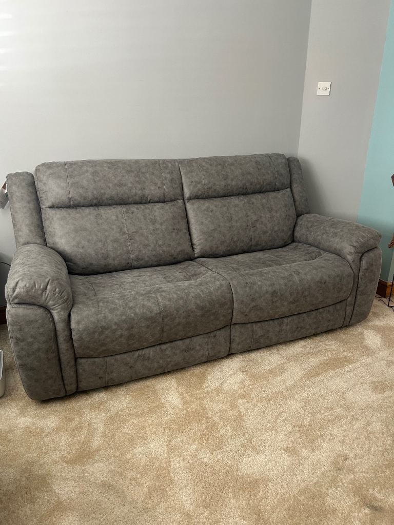 Grey suedette sofa and power reclining armchair