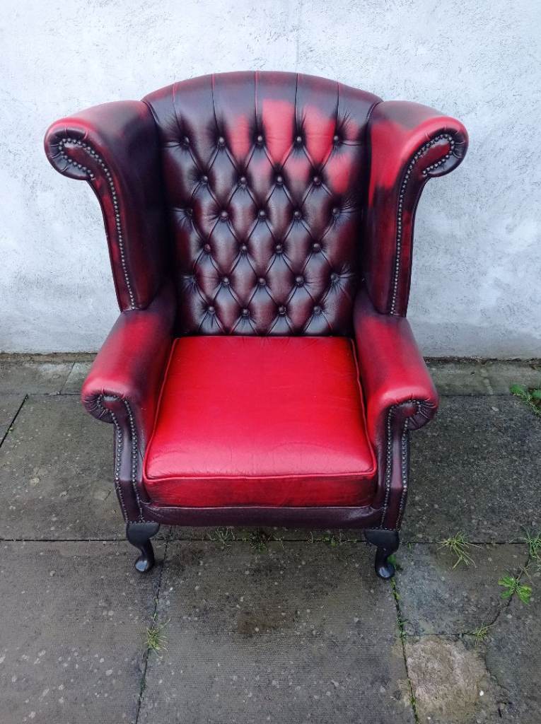 A Red Leather Chesterfield Queen Ann/Wing ArmChair