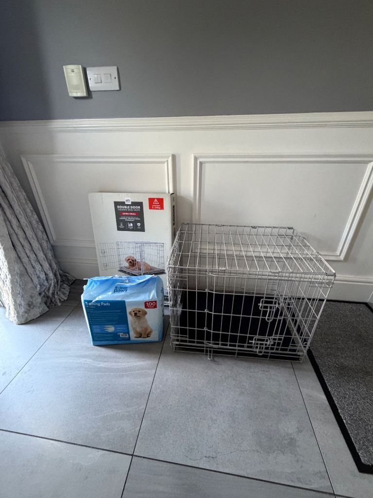 Dog cage and puppy pads
