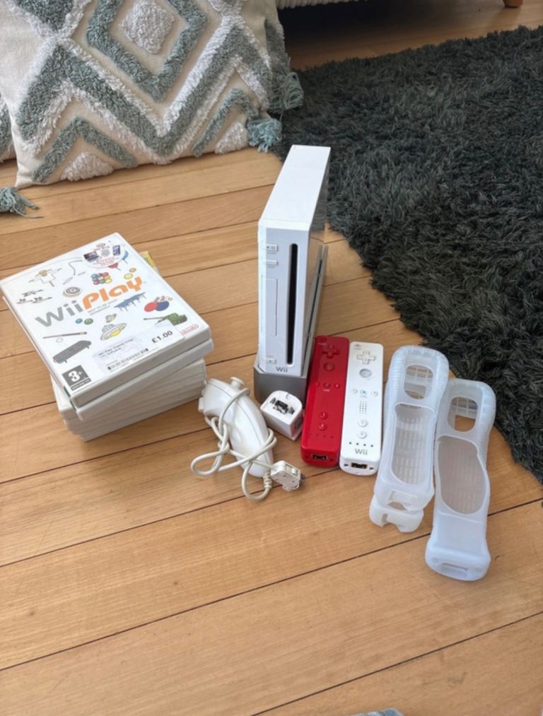 Nintendo Wii Console Bundle with Wii Fit Board and Games