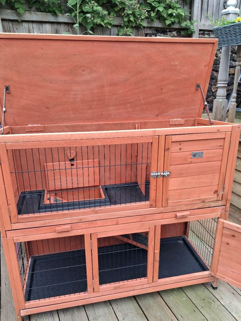 Two Tire Rabbot Hutch and Cover.
