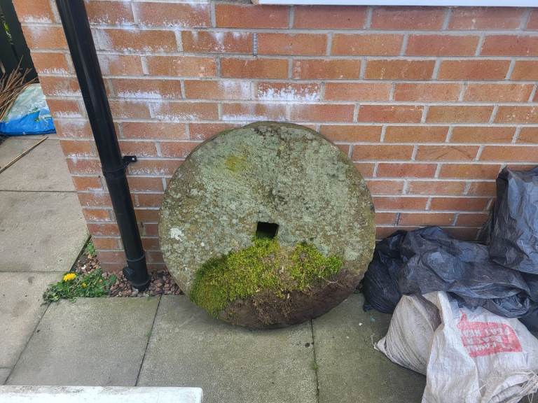 Decorative sandstone milstone 