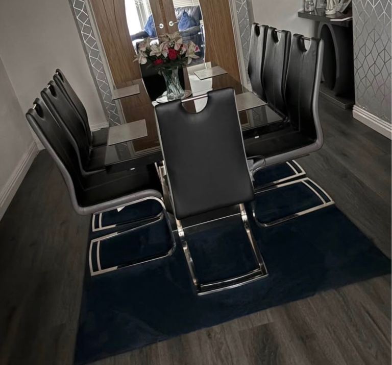 Black extendable Dining Table and matching side boards 
