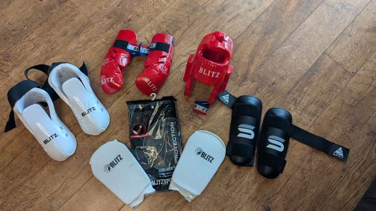 Child Blitz martial art equipment  including helmet, boots, shin pads, gloves