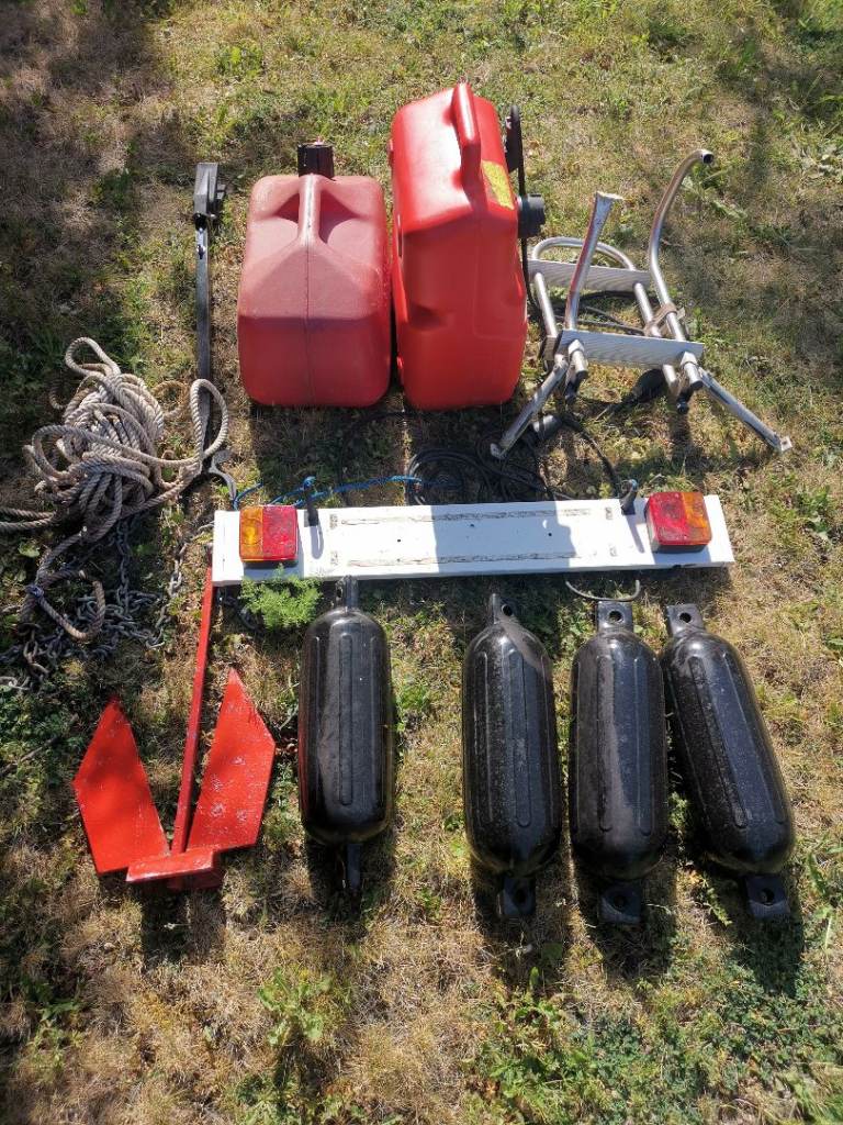 Collection of random boat accessories...fenders, anchor, ladder...