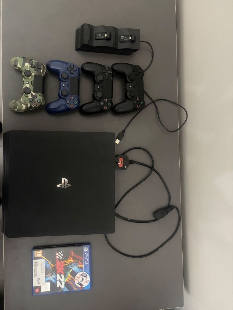 PS4 Console with 4 Controllers and Charging Dock