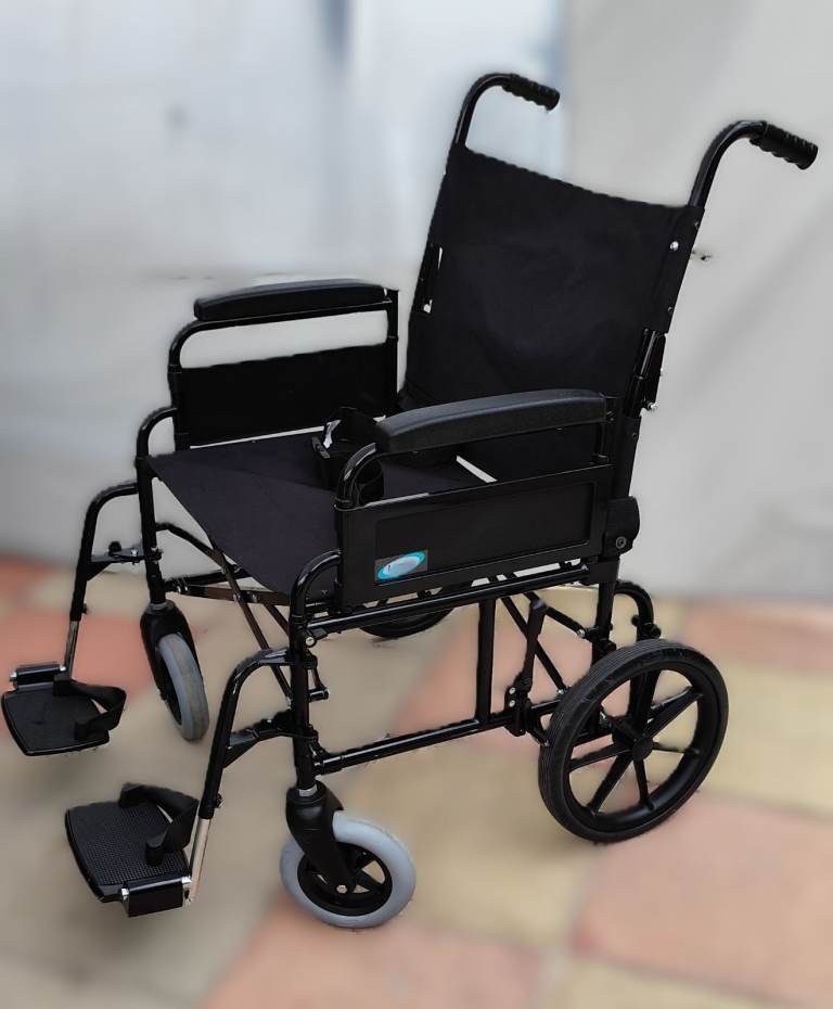 Extra large user assisted wheelchair in good working and clean order.