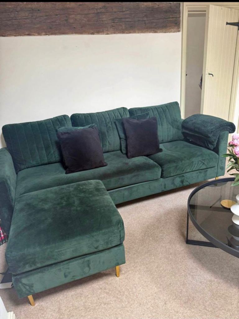 Three seater velvet sofa and footstool 
