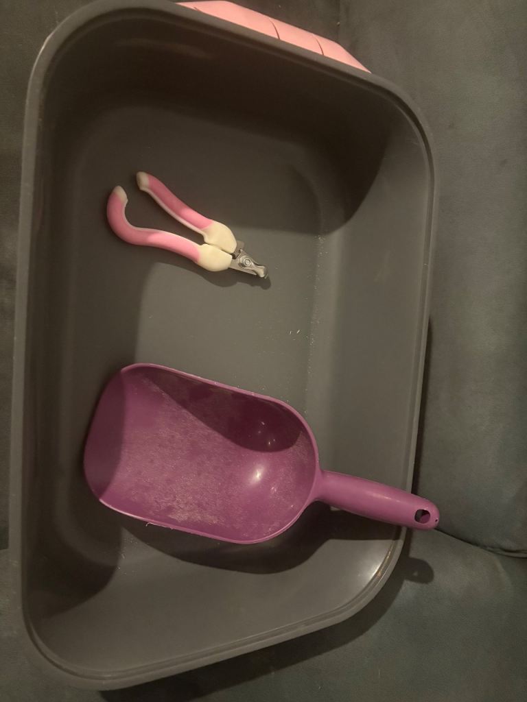 Grey Tray, 2 hides, a Scoop and Nail Clippers