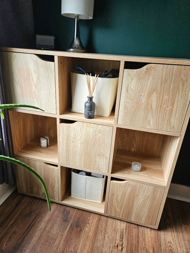 Storage cube cabinet with doors.