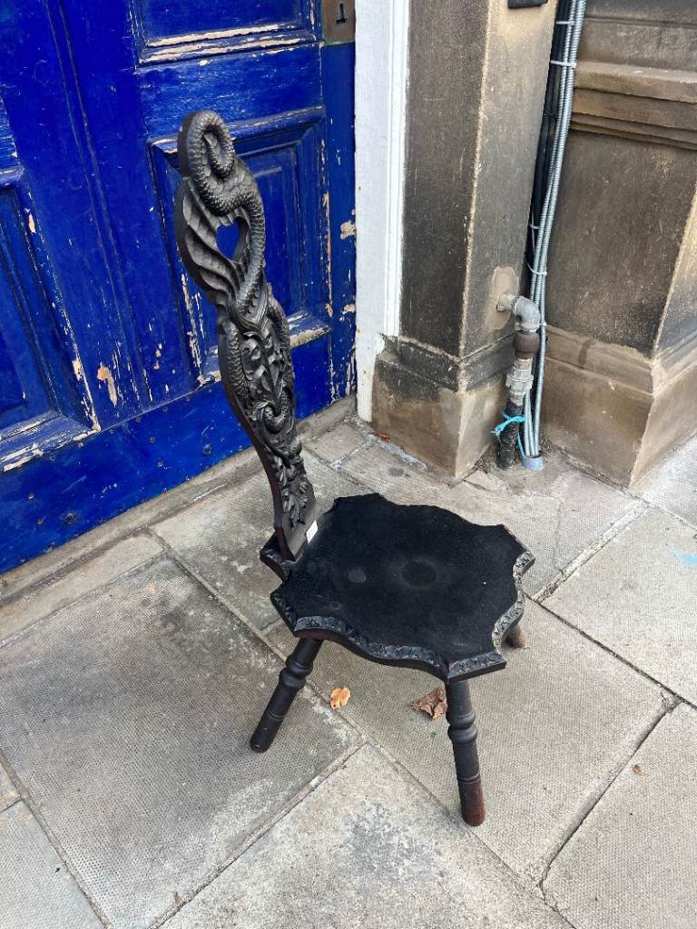Spinning Low Chair/Stool with carved detail with Thistles and Serpent . 