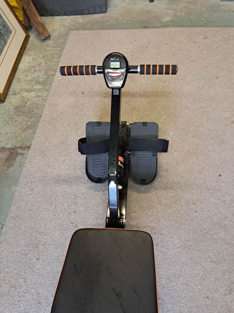 Folding Rowing Machine - Black and Orange, Good Condition