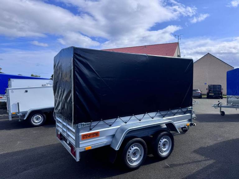 BRAND NEW 8,7ft x 4,2ft TWIN AXLE TRAILER WITH 150CM FRAME COVER AND RAMP 7500KG UN BARKED