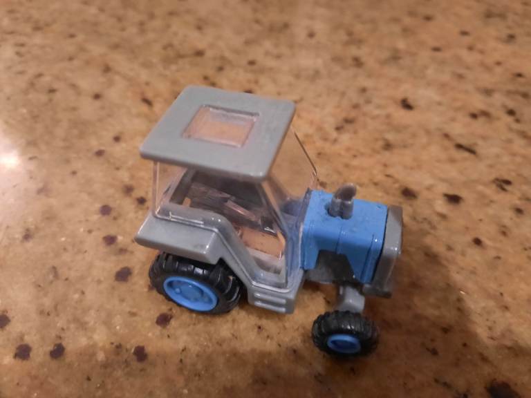 Tractor pencil sharpner