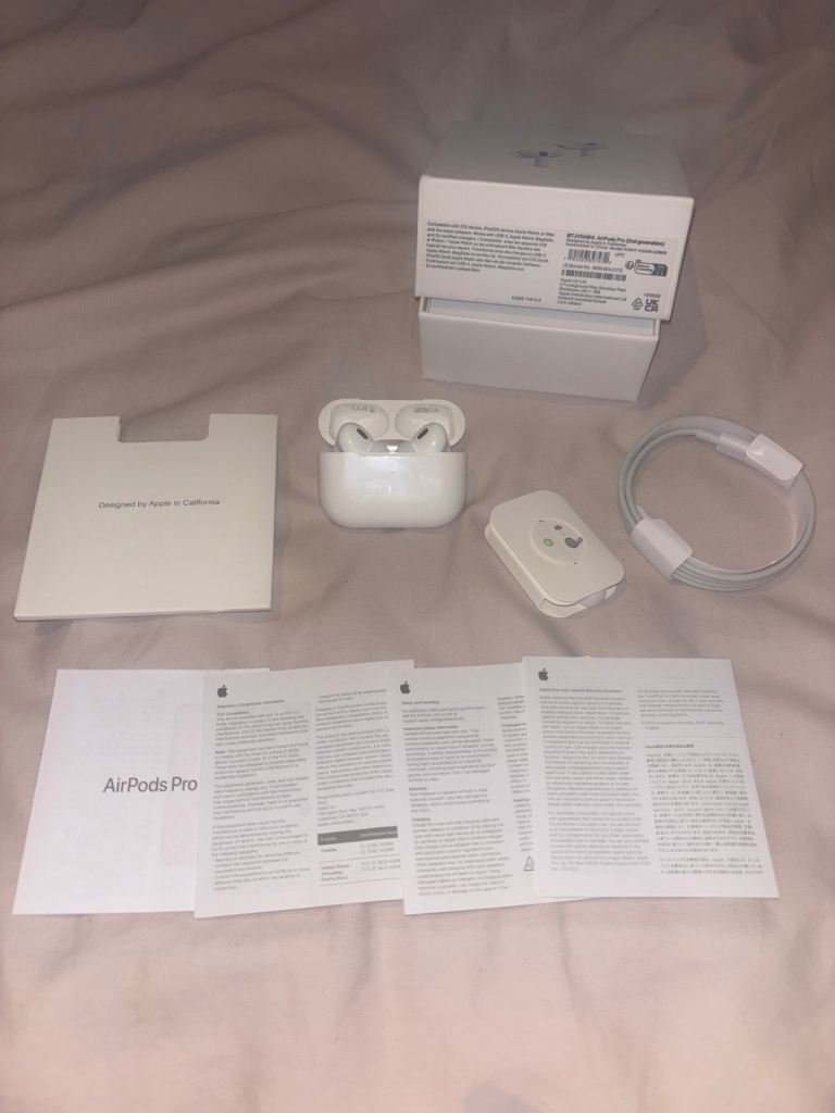 Apple AirPods Pro with Charging Case and Box – Good Condition