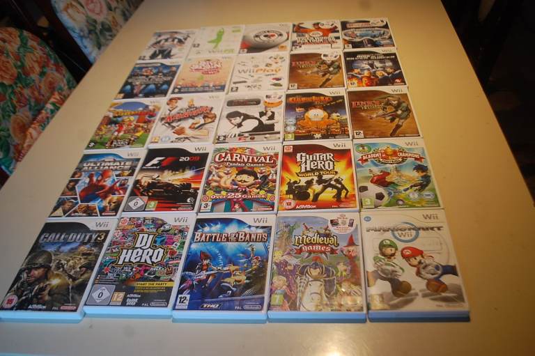 NINTENDO Wii BUNDLE WITH 25 GAMES PLUS MORE