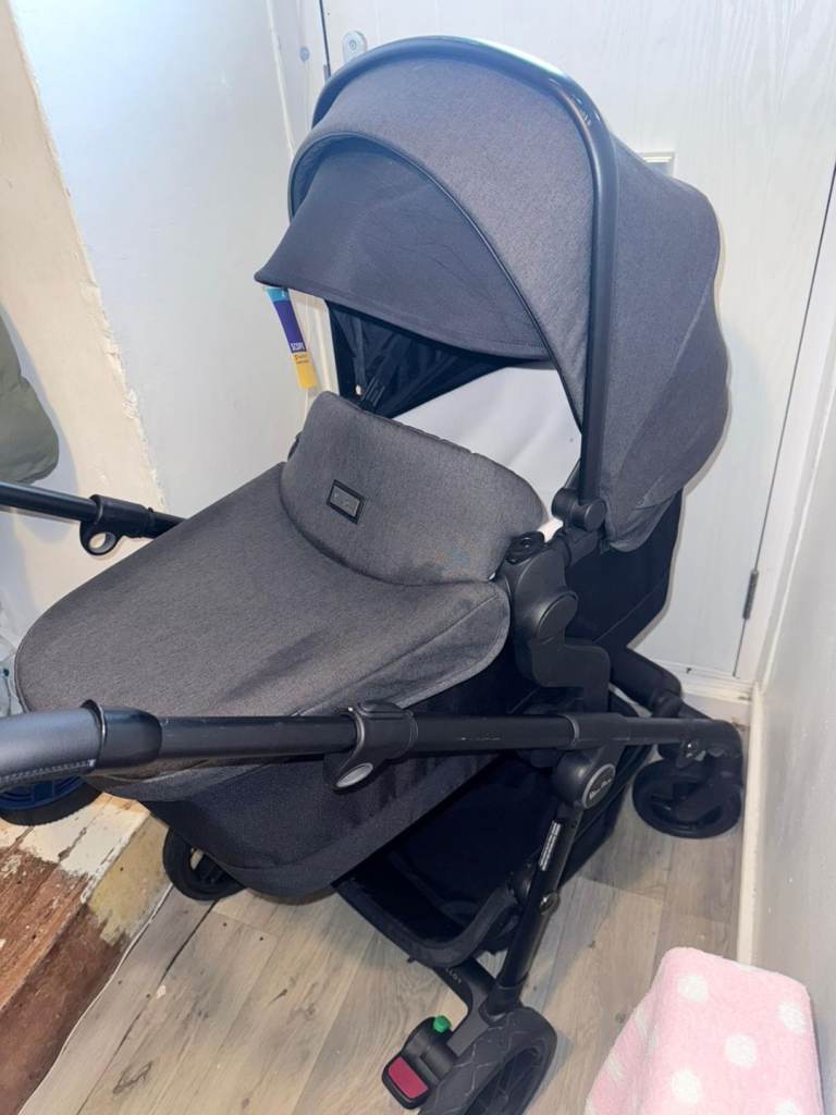 A silver cross pram 