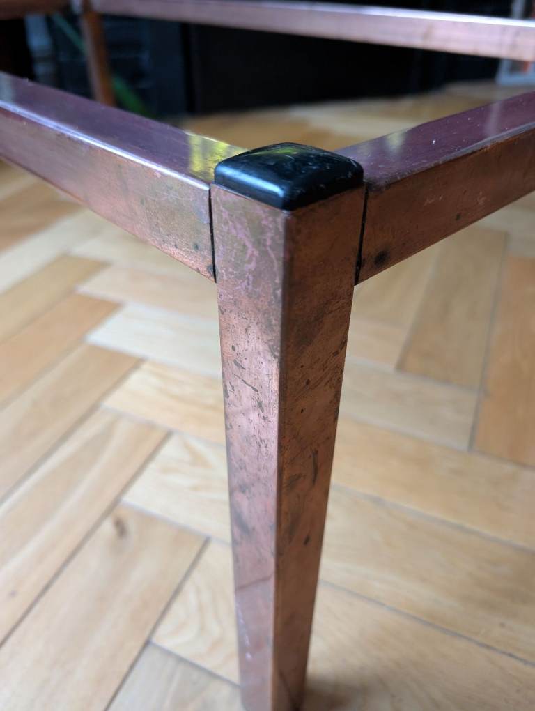 Stylish copper and glass coffee table
